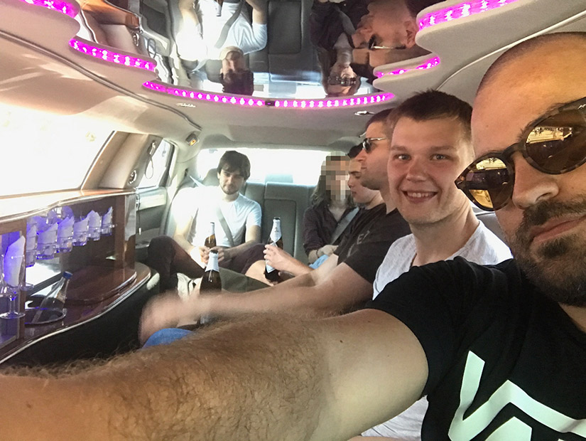 A photo of the team from inside a limousine