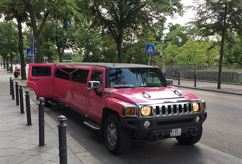 A bright pink limousine for the Uppy team.
