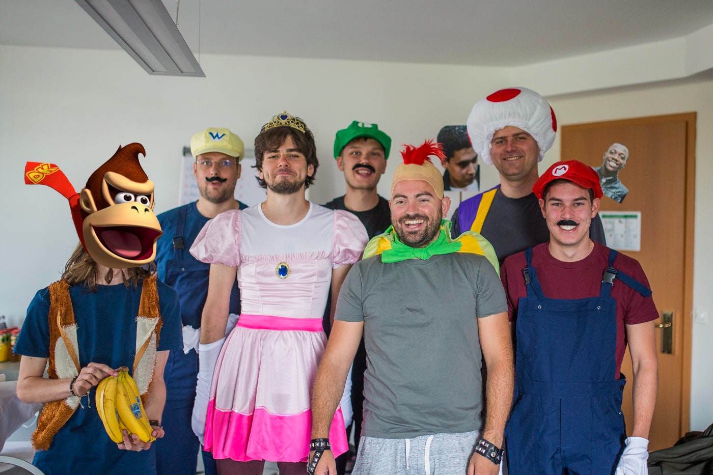 The Transloadit team all dressed up as characters from Mario.